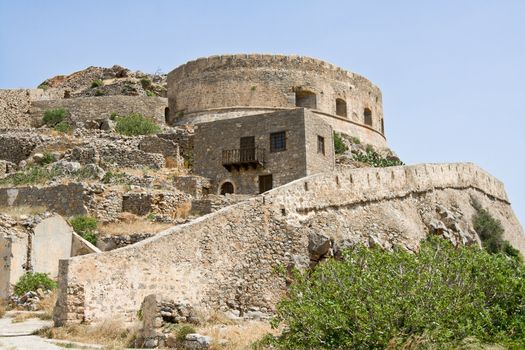 Abandoned ruin medieval fortress, leper colony on Spinalonga Kalydon island Crete Greece