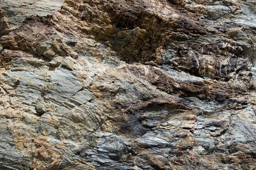 Dark brown with striae rock stone pattern, textured background