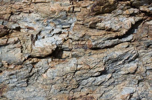 Rusty and gray striae on rock stone pattern, textured background