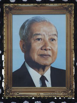 Phnom Penh - November 10 : Big portrait  of former king of Cambodia  Norodom Sihanouk  hang on the front of the Royal Palace  in Phnom Phen Cambodia on November 10 2012