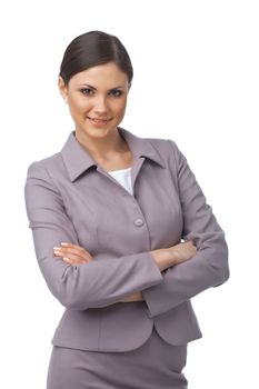  Pretty young business woman with hands folded looking at you on white background 