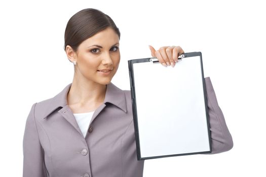 Businesswoman holding an empty clipboard over white background