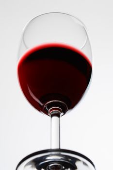 Glass with red wine isolated on white background 
