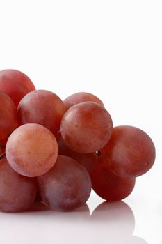 Red Grapes heap on white background
