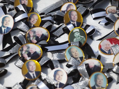 Phnom Penh - November 10 : former king of Cambodia  Norodom Sihanouk  badges on sale in front of the Royal Palace in Phnom Cambodia on November 10 2012  few weeks after his death