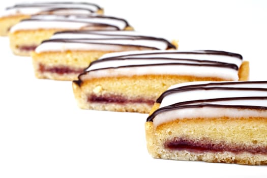 Cherry Bakewell Slices over a white background.