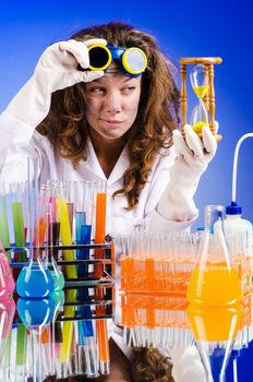 Funny female chemist in lab