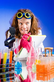 Funny female chemist in lab