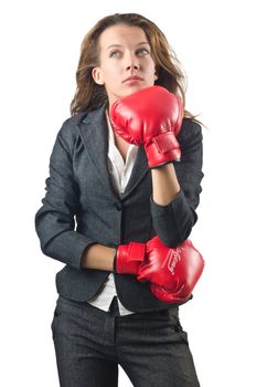 Young businesswoman in boxing concept