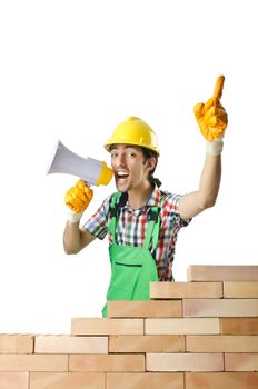 Builder with hard hat on white