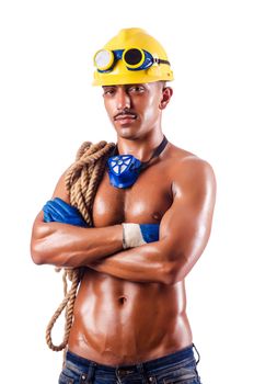 Muscular builder with tools isolated on white