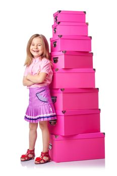 Little cute girl with lots of boxes