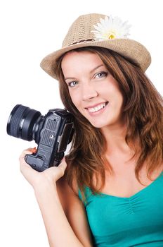 Attractive female photographer on white