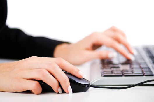 Hands working on the keyboard