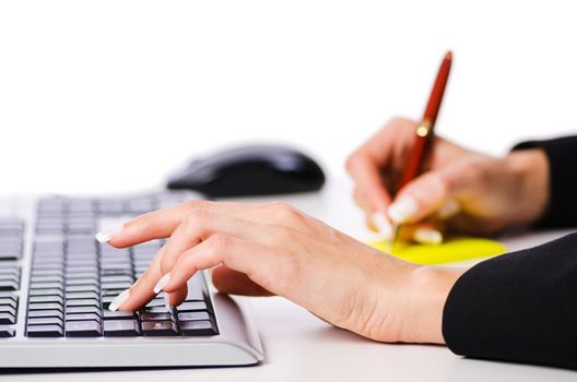 Hands working on the keyboard