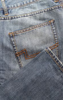 textured blue jeans pocket at the back