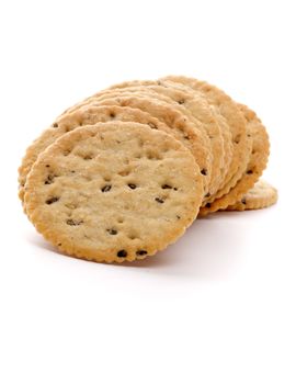 Dry Biscuits with Seeds in a Row closeup on white background