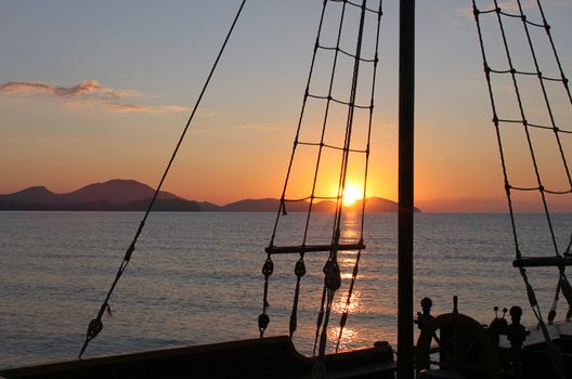 rigging of ship at sunrise