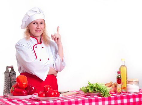 Portrait of attractive cook woman, with a raised finger
