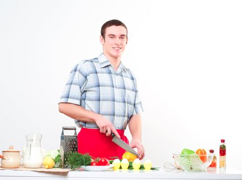 portrait of a man, cut vegetables, make meal