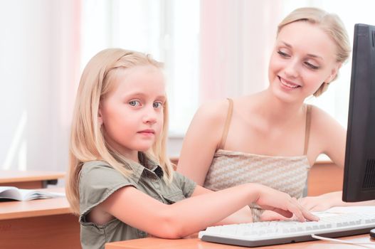 teachers are engaged with students, sitting next lesson explains