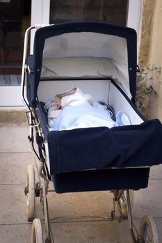 Infant in stroller, outdoor