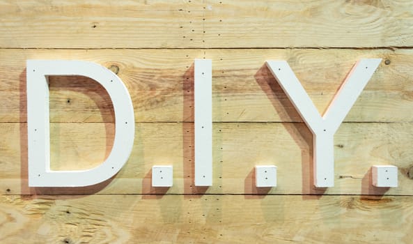 Thin flat piece of wood D.I.Y. letter with plank
