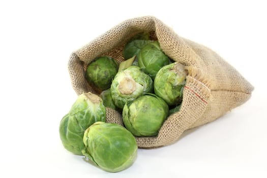 raw brussels sprouts in a jute sack