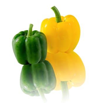 Yellow bell pepper  and green bell pepper over  white background with reflection