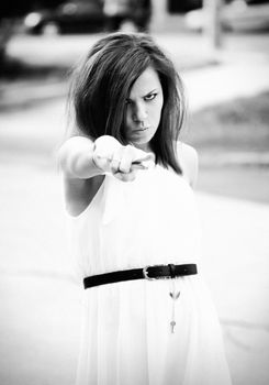 Black and white portraite of a girl rocking