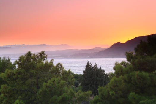 Sunset at Pefkos beach Rhodes Island in Greece