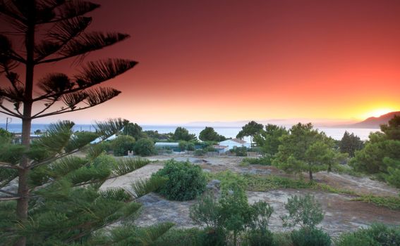 Sunset at Pefkos beach Rhodes Island in Greece