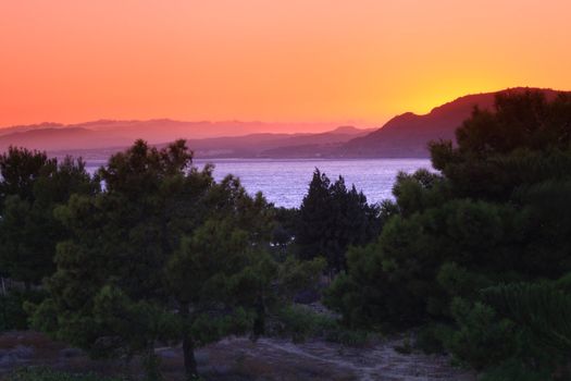 Sunset at Pefkos beach Rhodes Island in Greece