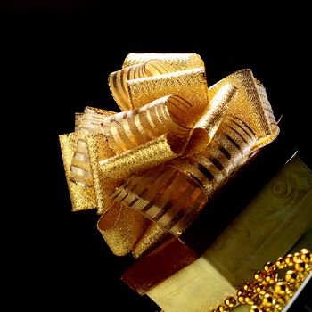 holiday gift on golden background close up