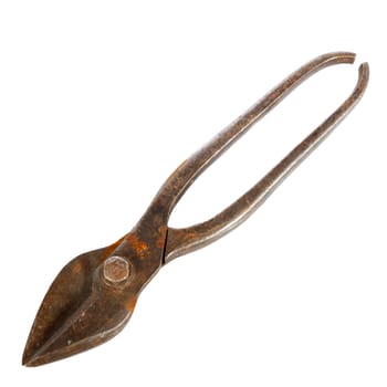 Old rusty metal scissors on a white background