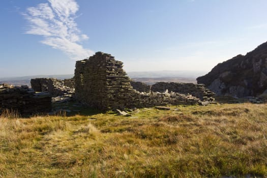 A mountain top ruin on a mountain in Wales