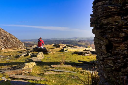 A mountain climber taking in the view