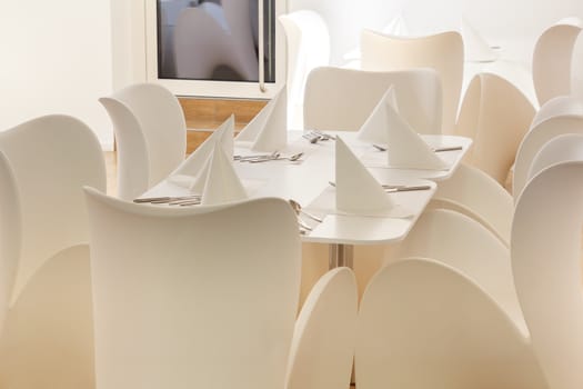 Beautiful white dining area with table and chairs for six 