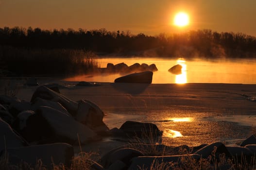 Scenic sunrise at the coast in wintertime 