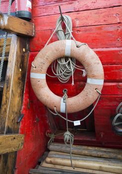 Red safe guard ring on old sailing ship