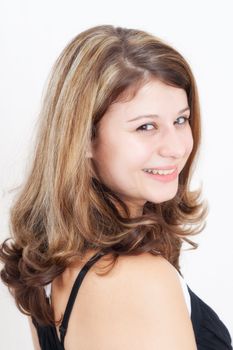 Portrait of a young brunette girl with brown eyes