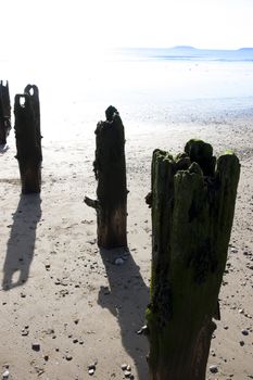 sunshine over the beach breakers in Youghal county Cork Ireland on a summers day