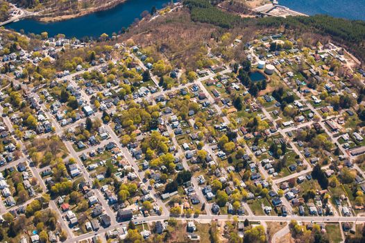 Aerial view of suburban Clinton, Massachusetts and water