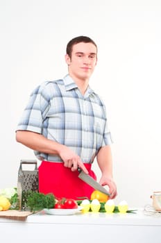 portrait of a man, cut vegetables, make meal