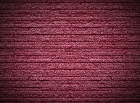 The surface is made of brick red background.