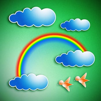 The sky is bright. The rainbow on the clouds. And the birds were flying.