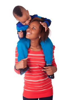 Happy child  smiled on the shoulders of her mother black african afro