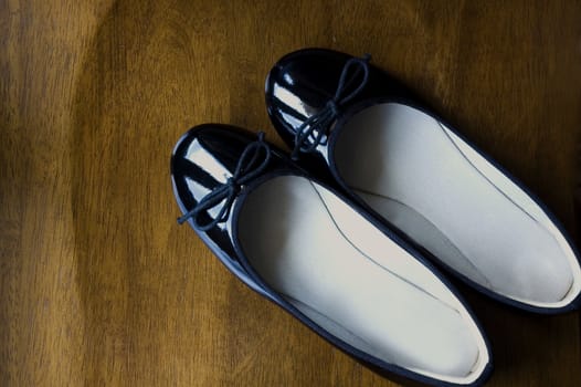 black shoes on wooden background