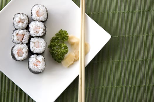 view on top of sushi set on green background