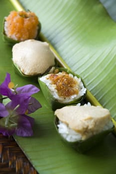 Thai dessert, sweet sticky rice with different kinds of topping